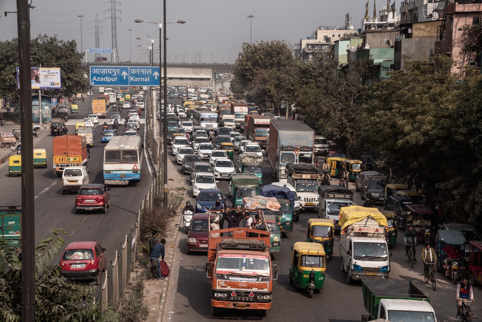Vehicles fuelled by diesel and other sources come to a halt in New Delhi, India