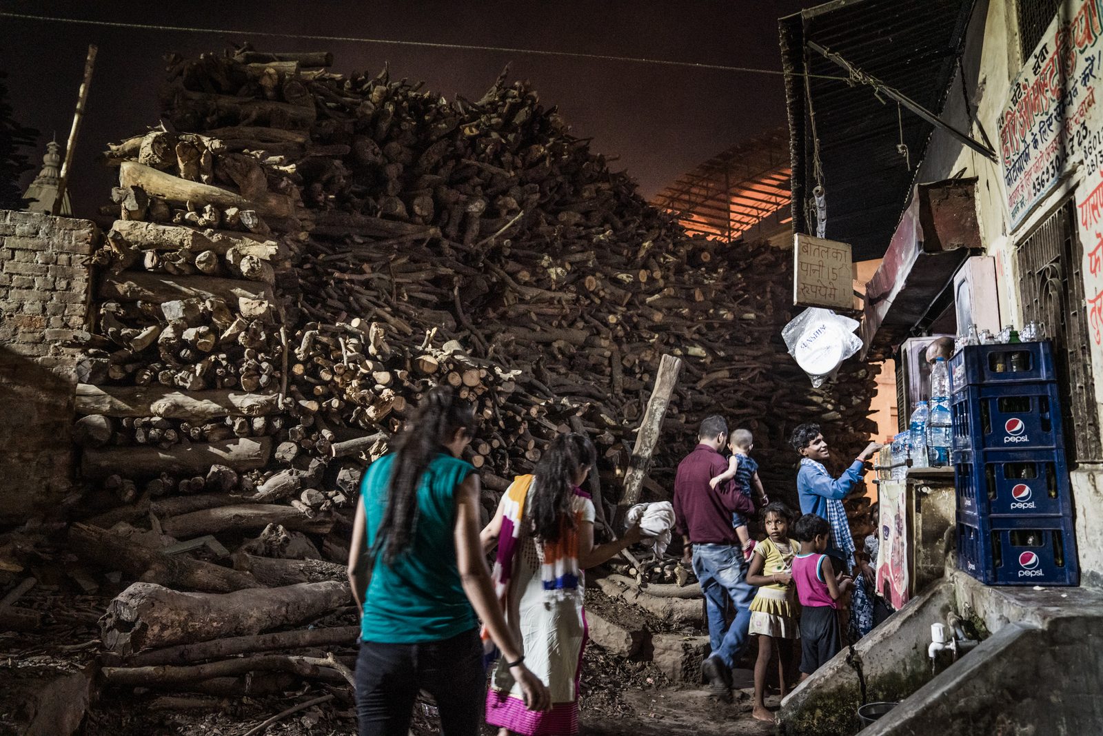 Stored wood for cremation pyres in Uttar Pradesh, India