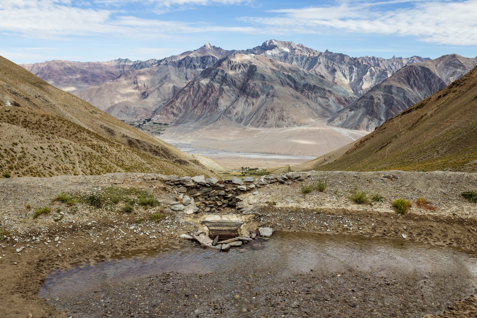 A dam above Kumik lies almost empty